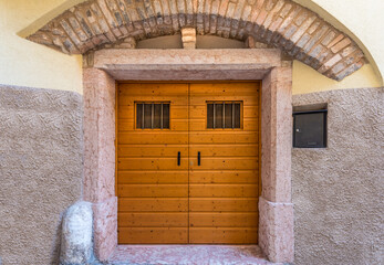 Entrance of an old apartment building in Malcesine, Italy.