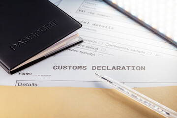 a Passport over Customs Declaration form. customs Agent concept. Planning a deal or shipping item...