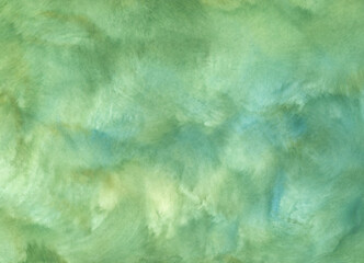 Hand painted fresh watercolor abstract background. Soft green background with paper texture. Background painted with a brush and a sponge on paper.