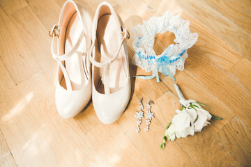 White stylish wedding shoes for bride. Close-up