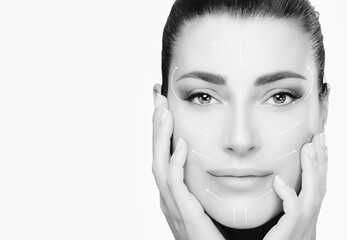 Surgery and Anti Aging Concept. Monochrome Beauty face spa woman with hands on cheeks looking at...
