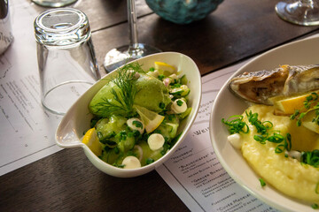 Fancy restaurant cucumber foam salad with dill and lemon. 
