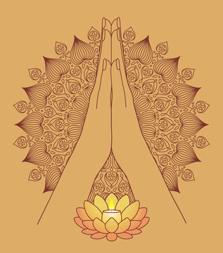 folded palms with burning lotus shaped candle on beige background