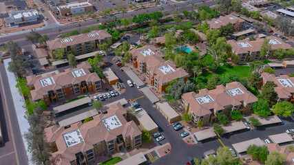 Fototapeta na wymiar Aerial roofs of the houses in the urban landscape of a small sleeping area Phoenix Arizona US