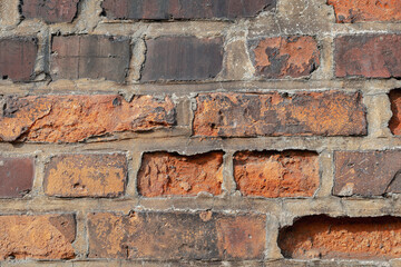 old half-ruined fragment of a brick wall