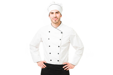 Portrait of an attractive cook ready to start cooking