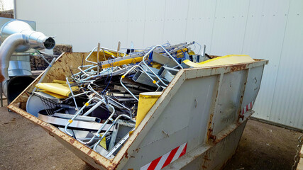a container full of metallic scrap
