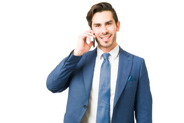 Young man smiling while taking a business call