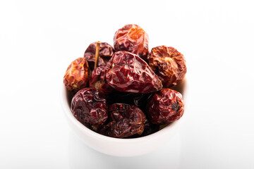 Dry red chili pepper. Dry red chili pepper in white bowl, on white background. small chili pepper