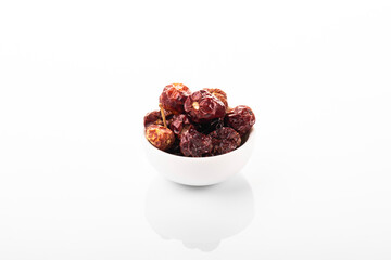 Dry red chili pepper. Dry red chili pepper in white bowl, on white background. small chili pepper