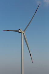 large wind turbine against the blue sky