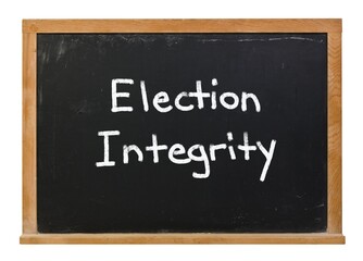 Election Integrity written in white chalk on a black chalkboard isolated on white
