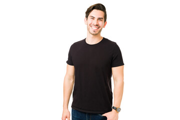 Studio shot of an attractive excited man in a white background