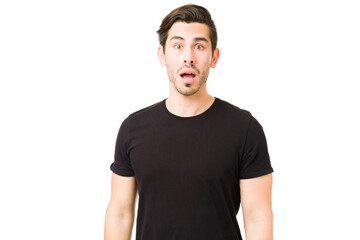 Hispanic young man can't believe the news he received