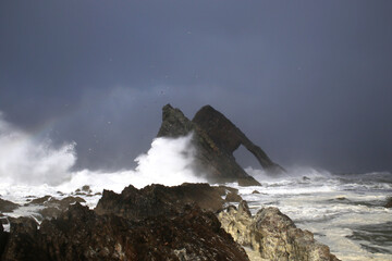 waves crashing on rocks