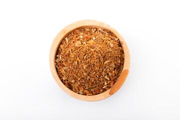 Ras el hanout moroccan spice. Ras el hanout in wooden bowl, on white background. Moroccan spice