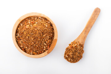 Ras el hanout moroccan spice. Ras el hanout in wooden bowl, on white background. Moroccan spice