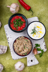 Baba ganoush, tzatziki and tomato ezme