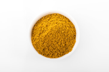 Ras el hanout moroccan spice powder. Ras el hanout in white bowl, on white background. Moroccan...