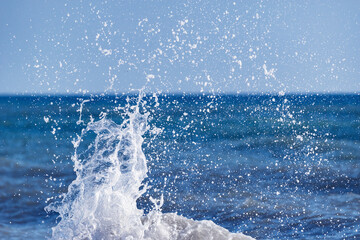 Wave of the sea water at sunny day time.