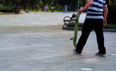 Boy riding a skateboard in the park