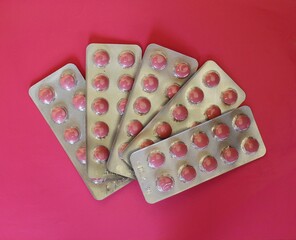 pink pills in a pack