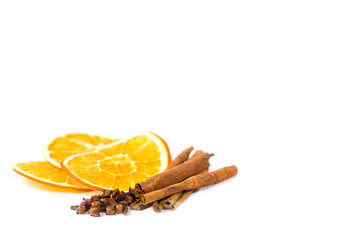 dried orange and cinnamon sticks and clove spice, isolate
