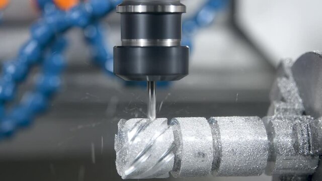 milling cnc machining. cutting tool processing metal detail on milling machine in workshop