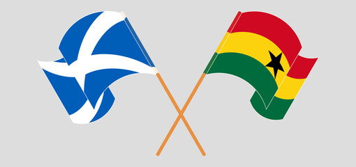 Crossed and waving flags of Scotland and Ghana