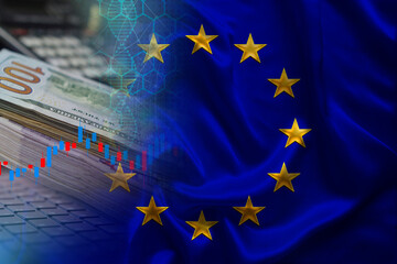 EU national flag on silk, dollar bills, computer, concept of global trading on the stock exchange, falling and rising prices for world currency