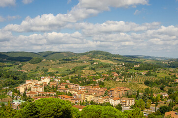 Fototapeta na wymiar Panorama view of a beautiful vilage in Tuscany. Italy. Wine region.