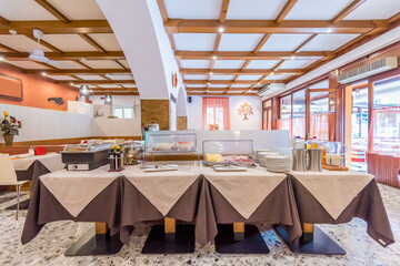 Catering service. Restaurant tables with food at breakfast.