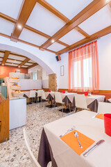 Restaurant interior. Small restaurant in Italy.