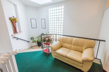 Beautiful room interior in new luxury home. View of stairs, and second story area.