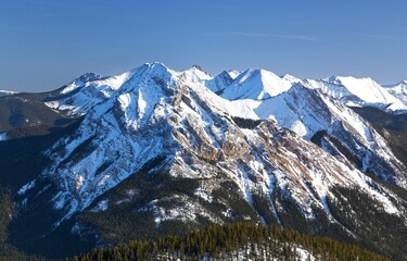 Fototapeta na wymiar Snow Covered Mount Baldy Peak in Alberta Kananaskis Country Mountain Range. Early Springtime Landscape Scenery in Canadian Rockies