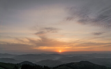 The sunrise is high in the mountains.