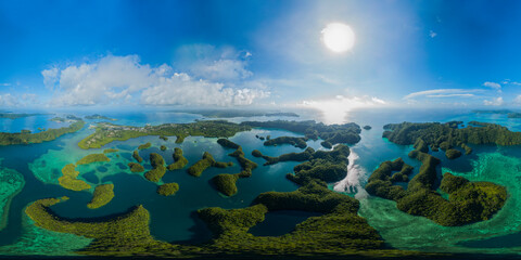 Wide panoramic aerial shot of Palau Rock Islands and ocean.