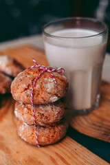 Freshly baked aromatic homemade cakes with a glass of milk