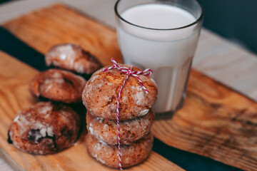 Freshly baked aromatic homemade cakes with a glass of milk