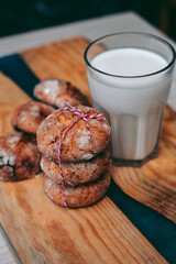 Freshly baked aromatic homemade cakes with a glass of milk