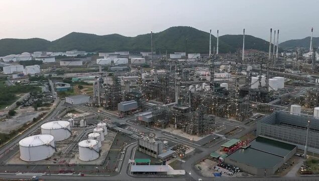 aerial view,Crude oil flows from pipelines to the oil refining plant to produce gasoline, gasohol, E20 diesel fuel to fuel cars and drive the economy within and around the world.