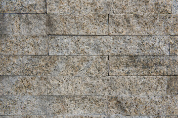 Natural gray stone brick wall background .Copy space.