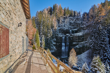 Beautiful Waterfall Vallesinella in Madonna di Campiglio in the autumn time, National Park...