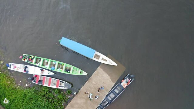 DRONE DJI MAVIC 2 PRO AERIAL IMAGE BOAT LEAVING THE RINGS OF THE RIVER OIAPOQUE BRAZIL AMAZON FOREST