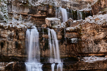 Beautiful Waterfall Vallesinella in Madonna di Campiglio in the autumn time, National Park Adamello-Brenta,Trentino,Italy Dolomites