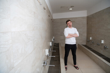 a portrait of a Muslim in the premises of a mosque which they serve to perform ablution