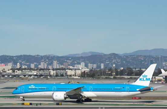 Los Angeles International Airport, California, USA - January 1, 2021: this image shows a KLM Dreamliner (Boeing 787, registration PH-BKD) taxiing toward a gate at LAX shortly after landing.