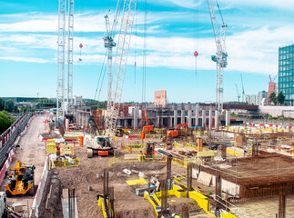 Constructiion building site with diggers and cranes