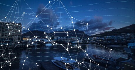 Composition of net of connections over a cityscape in background