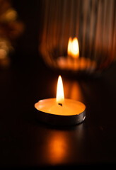 burning candle in the dark